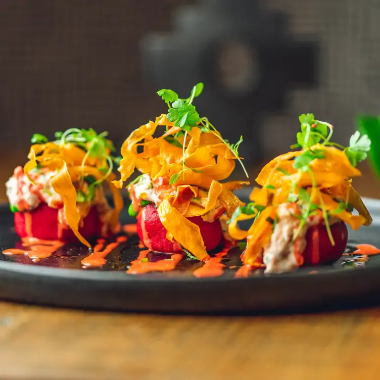 A Peruvian starter with colourful garnish at Chakana, one of the best date night restaurants in Birmingham.