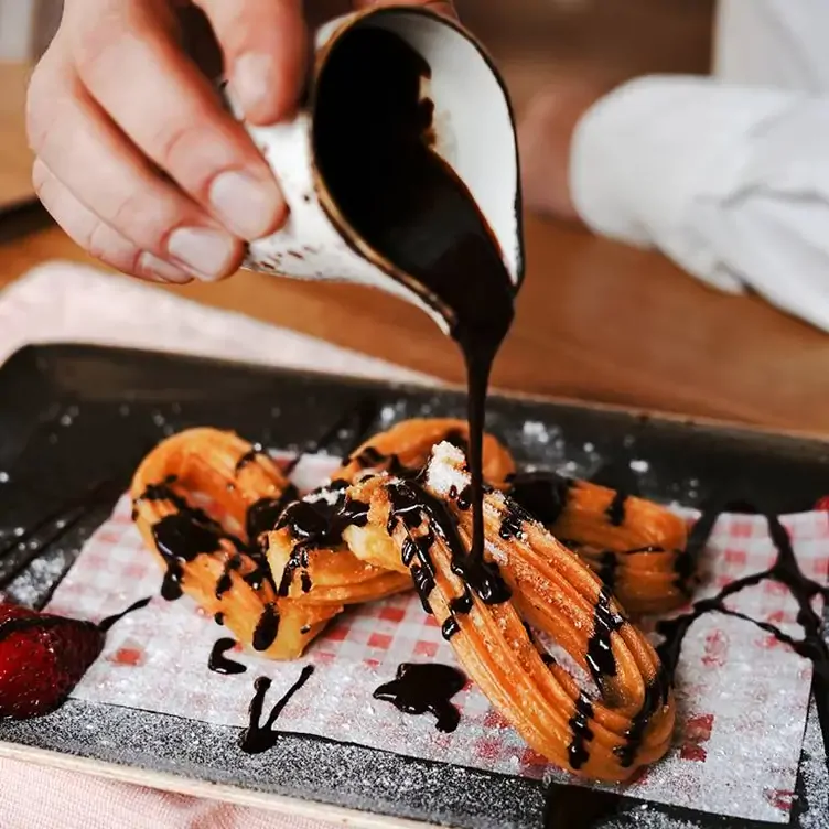 Churros with chocolate sauce at La Casa, one of Edinburgh’s best romantic restaurants.