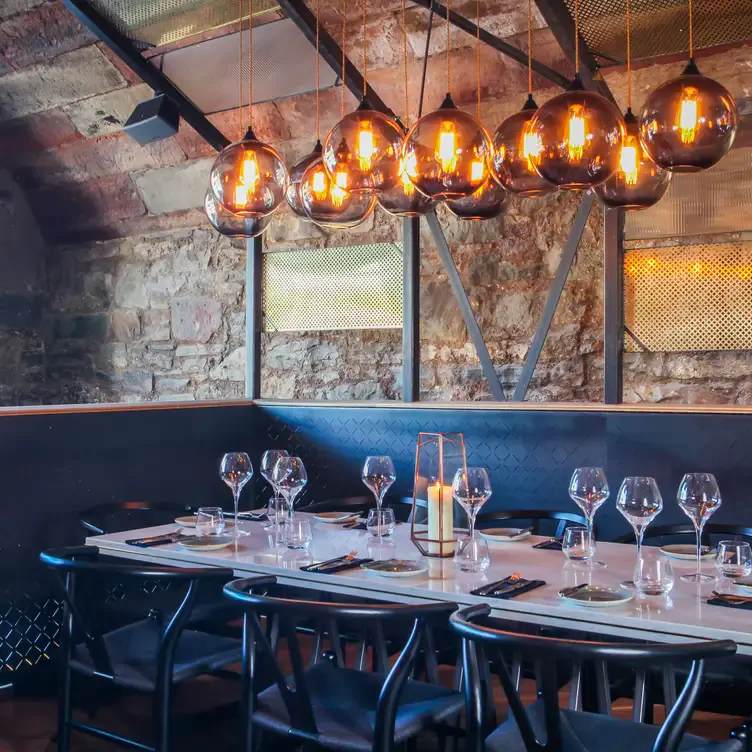 A table laid with wine glasses at Chop House Market Street, one of the best date night restaurants in Edinburgh