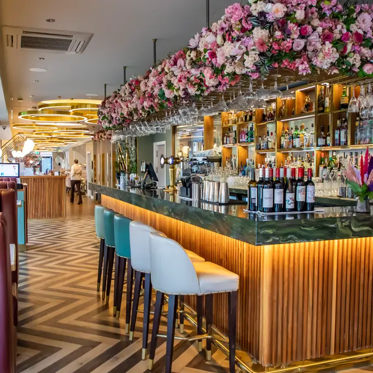 The brightly lit and modern bar area and entrance to Noel’s Bar and Restaurant.