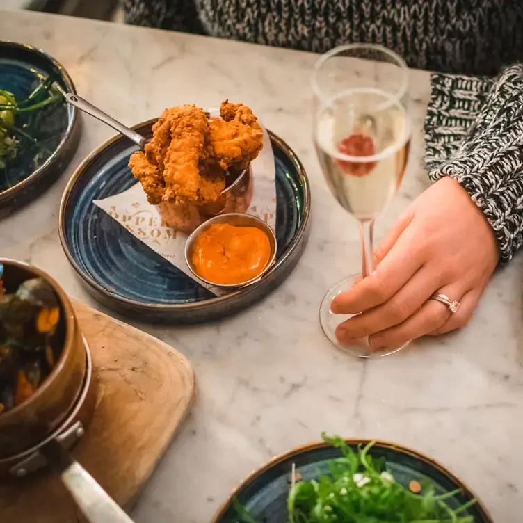 Champagne and crispy fried chicken at Copper Blossom, one of Edinburgh’s best romantic restaurants