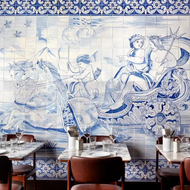 The blue and white azulejos-tiled dining room at Bar Douro, one of the best romantic restaurants in London