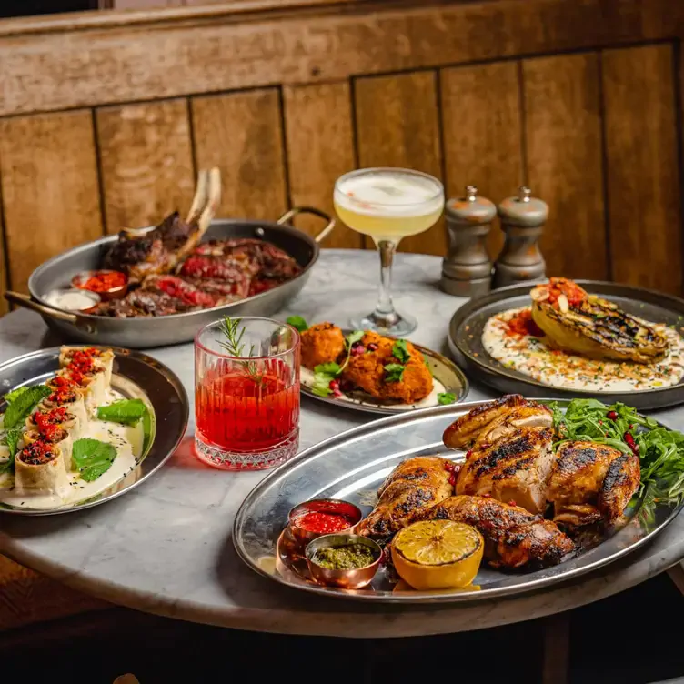 A spread of Mediterranean plates and cocktails at Sonya, one of the best brunch places in London