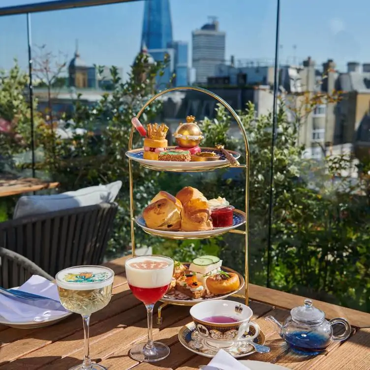 An afternoon tea on a sunny rooftop overlooking London at Mercer Roof Terrace