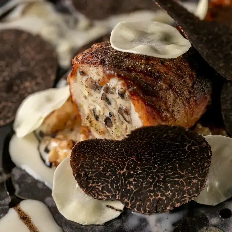 A dish showcasing seasonal truffles at The Ledbury, a restaurant in London