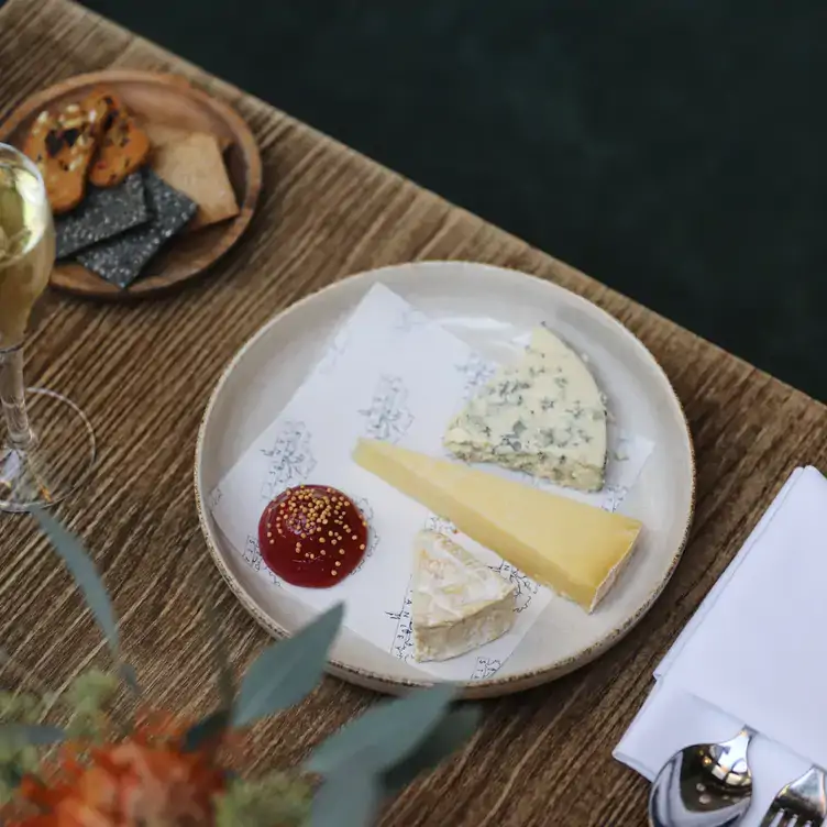 A selection of cheese at Stanley's, one of the best gardens in London for outdoor dining