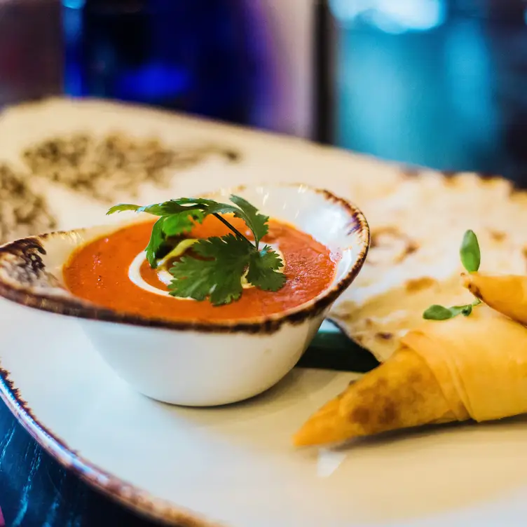 A curry and samosa side dish at Asha’s, one of the best Indian restaurants in Manchester. Credit: Asha’s Manchester