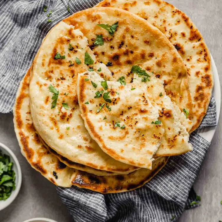 Naan bread with herbs at Ashoka Southside, one of the best Indian restaurants in Glasgow. Credit: Ashoka Southside