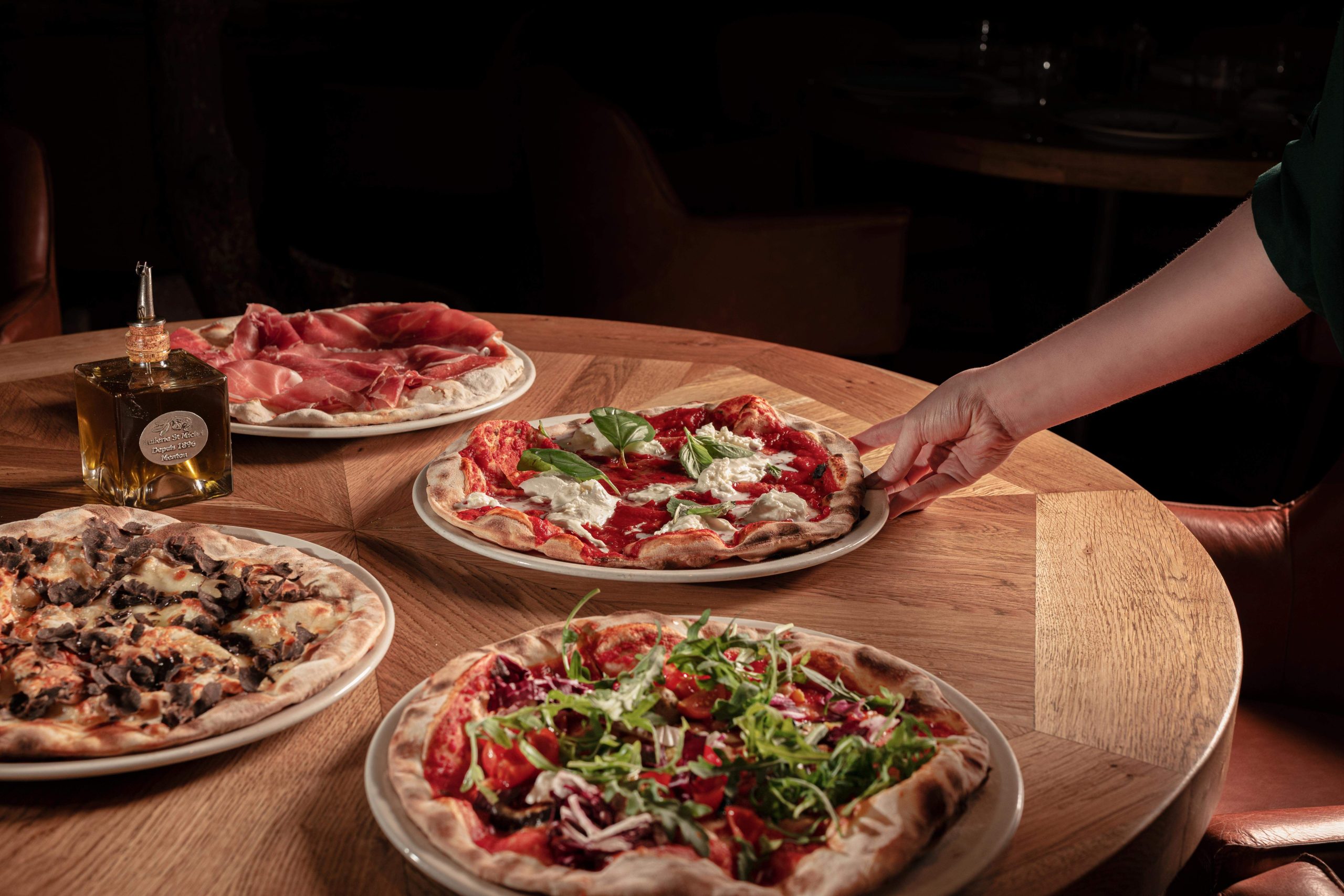 A range of pizzas at Bocconcino Mayfair, one of the best Italian restaurants in London. Credit: Bocconcino Mayfair