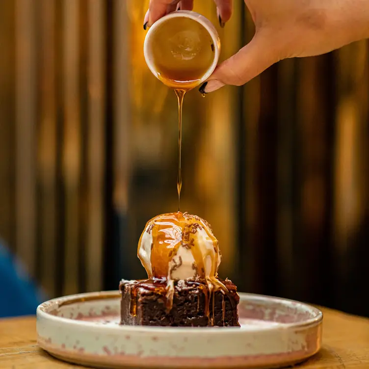 A dessert of ice cream and chocolate brownie at Delhi House Cafe, one of the best Indian restaurants in Manchester. Credit: Delhi House Cafe