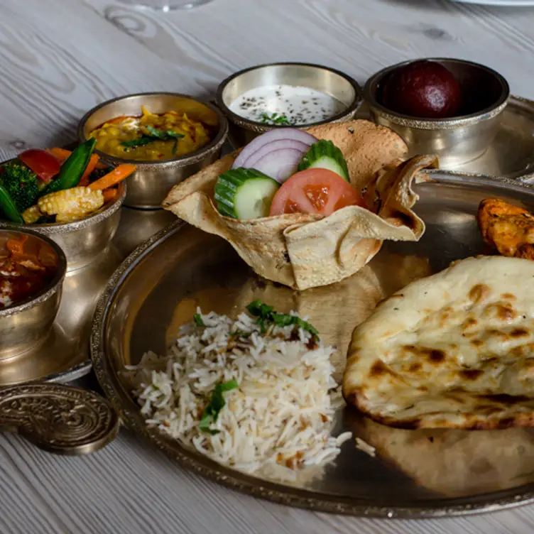 A starter dish served with various dips and vegetables at Wah Ji Wah, one of the best Indian restaurants in Manchester. Credit: Wah Ji Wah