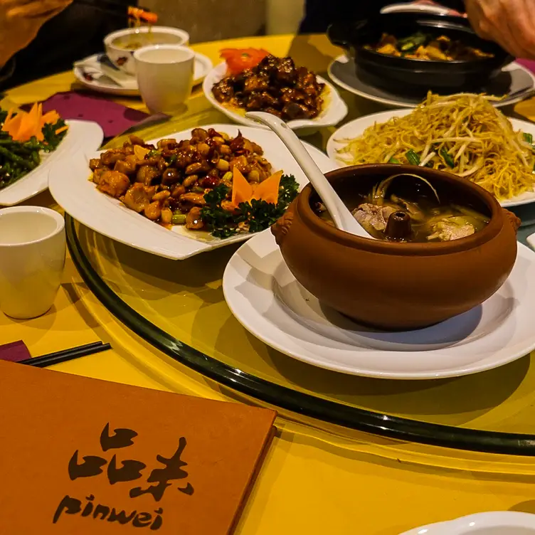 A range of dishes including noodles, beansprouts, vegetables and meats at Pinwei Chinese Restaurant.