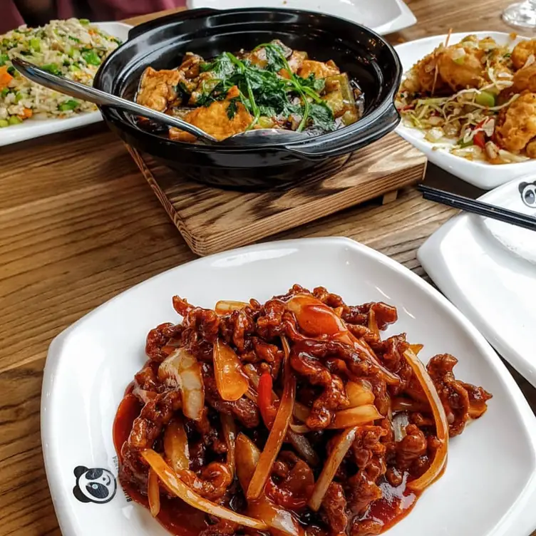 A selection of vegetable, noodle and meat dishes at Blue Eyed Panda.