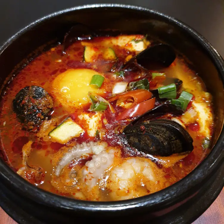 A one pot with mussels, chilli and egg at 3KOBROS Korean Restaurant, one of the best Korean restaurants in London.