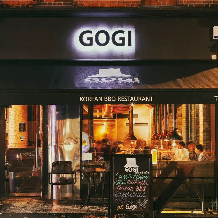 The exterior of the restaurant with a welcome sign at Gogi Restaurant, one of the best Korean restaurants in London.