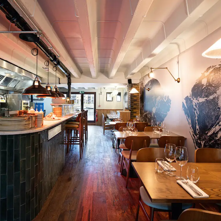 A modern and chic interior of the restaurant at The Melusine in London.