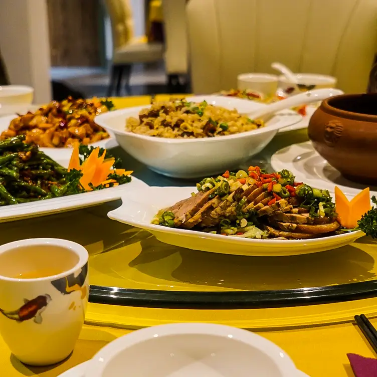 A selection of meals from the menu, including rice, legumes and meats, at Pinwei Chinese Restaurant.