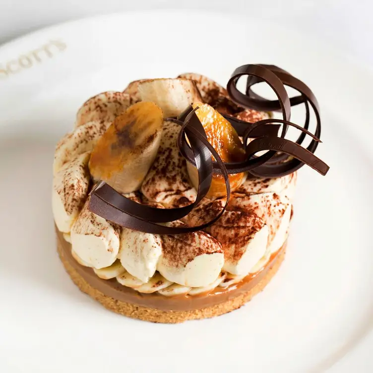 A plate of a banoffee pie dessert at Scott’s, one of the best seafood restaurants in London.