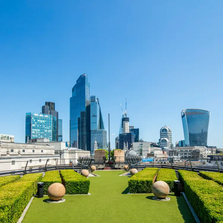 The rooftop garden at Coq d’Argent, one of the best French restaurants in the city.