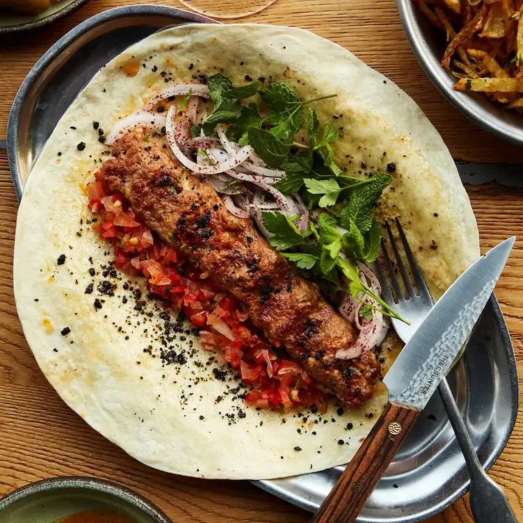 A traditional kebab with meat and salad at The Counter, one of the best Turkish restaurants in London.