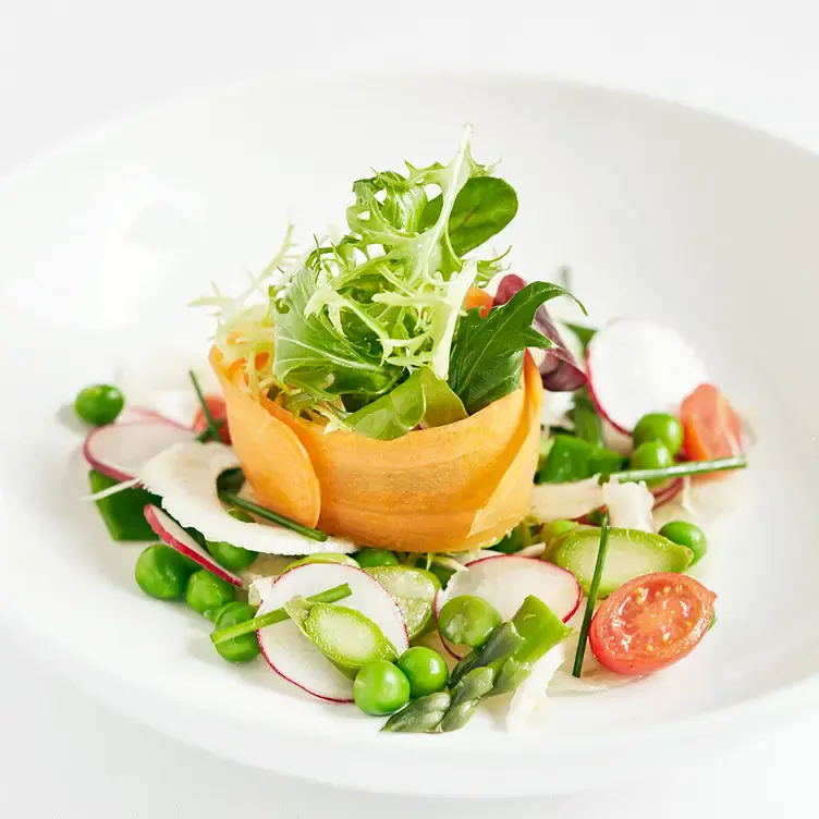 An artistically plated salad served at Locanda Locatelli, one of the best MICHELIN star restaurants in London.