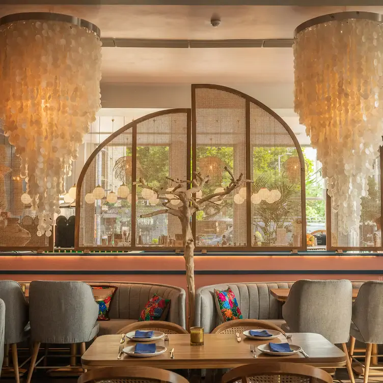 The interior, including tables and chairs, at Mestizo, one of London’s best Mexican restaurants.