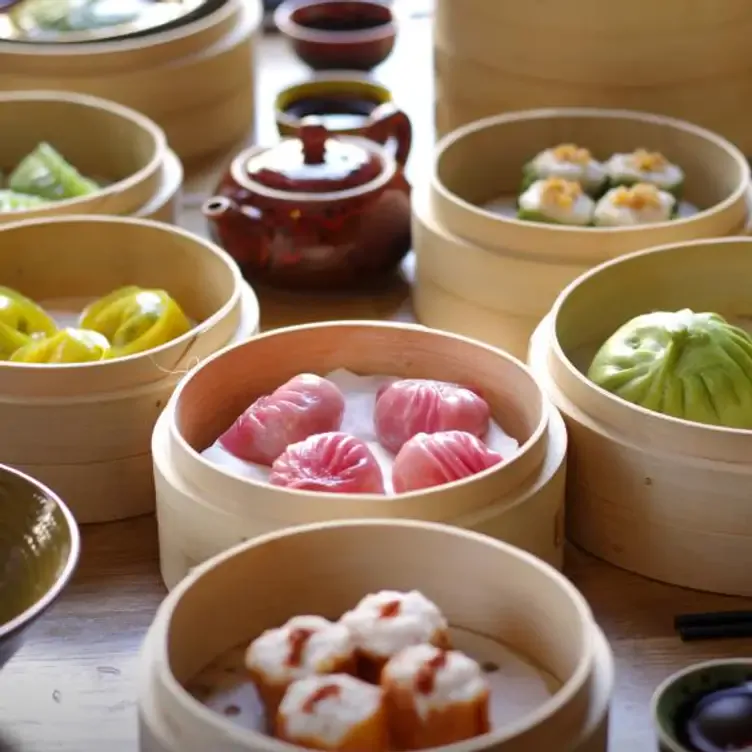 Colourful steamed dumplings in baskets at Baozilnn, one of London’s best dim sum restaurants