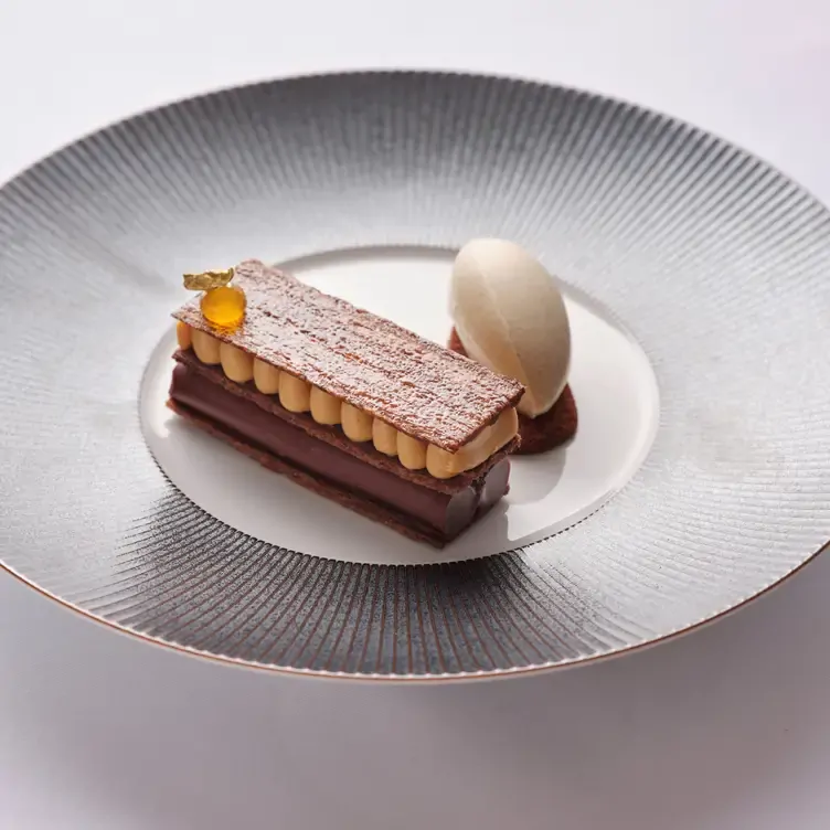 A fine dining chocolate millefeuille dessert at Ormer Mayfair, a new MICHELIN-starred restaurant