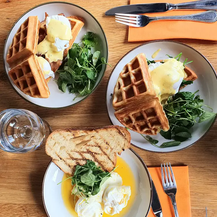 Waffles and poached eggs at The Woollen Mills, one of the best brunch places in Dublin.