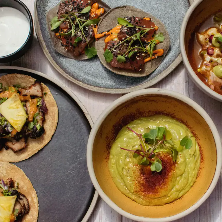 A range of colourful starters presented in bowls at Chingon Tacos, one of London’s best Mexican restaurants.