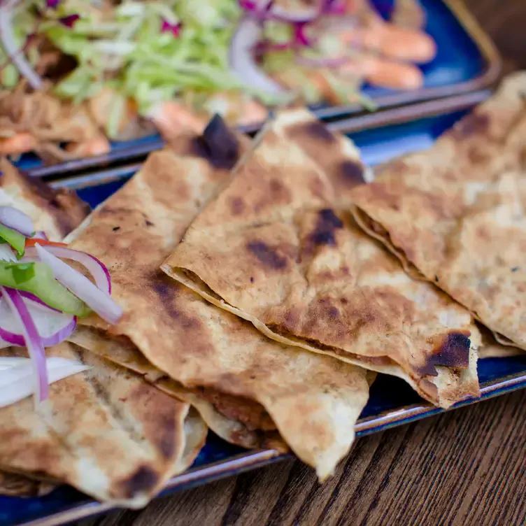 A stuffed flatbread starter at Massis Grill & Bar, one of the best Lebanese restaurants in London.