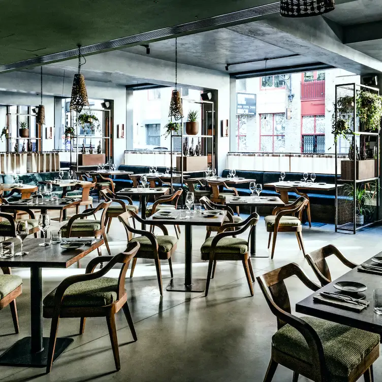 Tables, chairs and the interior at zapote, one of the best Mexican restaurants in London.