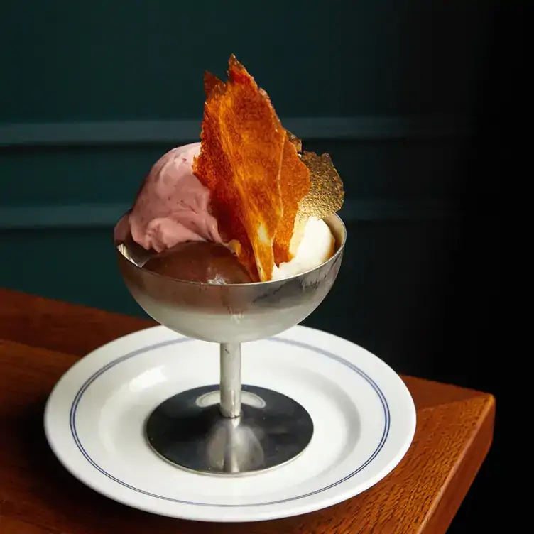 A fine dining ice cream dessert at 64 Goodge Street, one of the new MICHELIN Star restaurants in the UK.