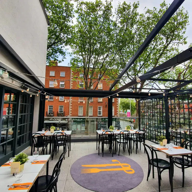 The outdoor terrace with fairy lights at The Woollen Mills, that serves one of Dublin’s best brunches.