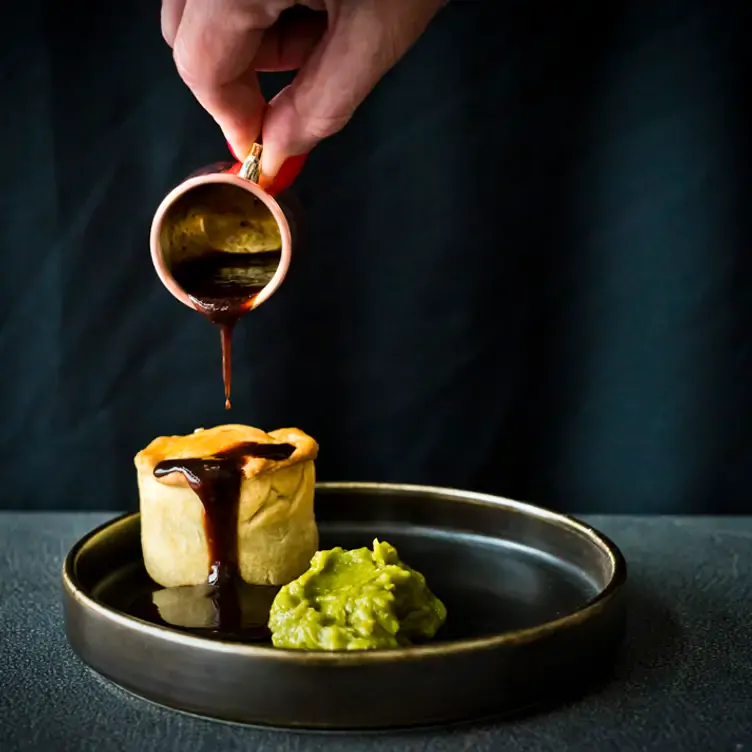 A pastry with sauce and avocado at Albert’s, one of Manchester’s best brunch restaurants.