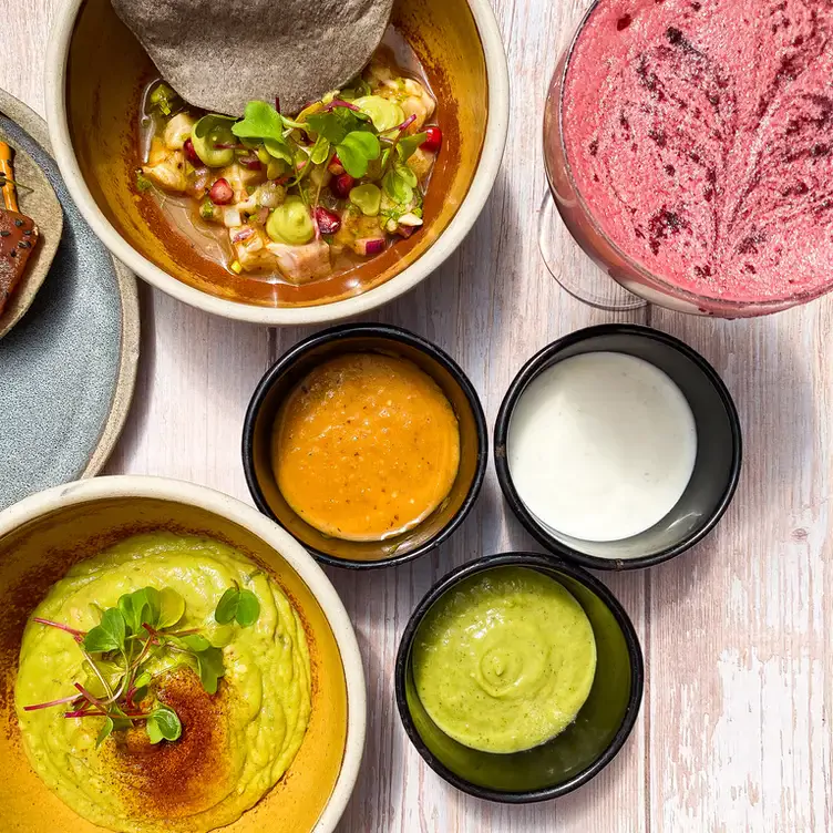 A variety of dips at Chingon Tacos, one of the best Mexican restaurants in London.