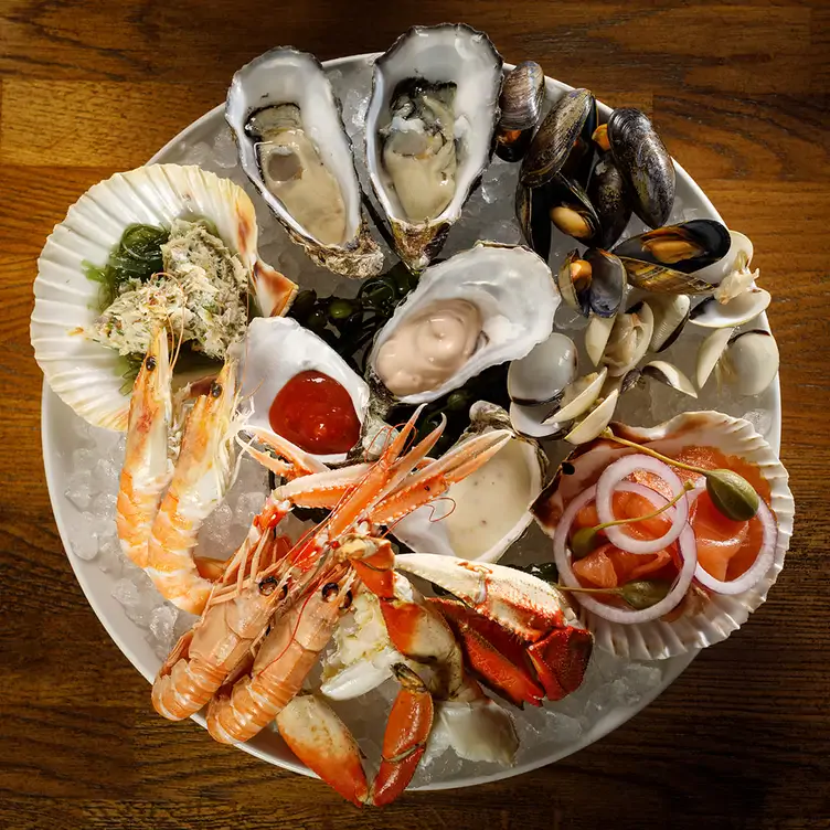 A shellfish platter on crushed ice at SOLE Seafood & Grill, one of the best restaurants in Dublin for seafood.