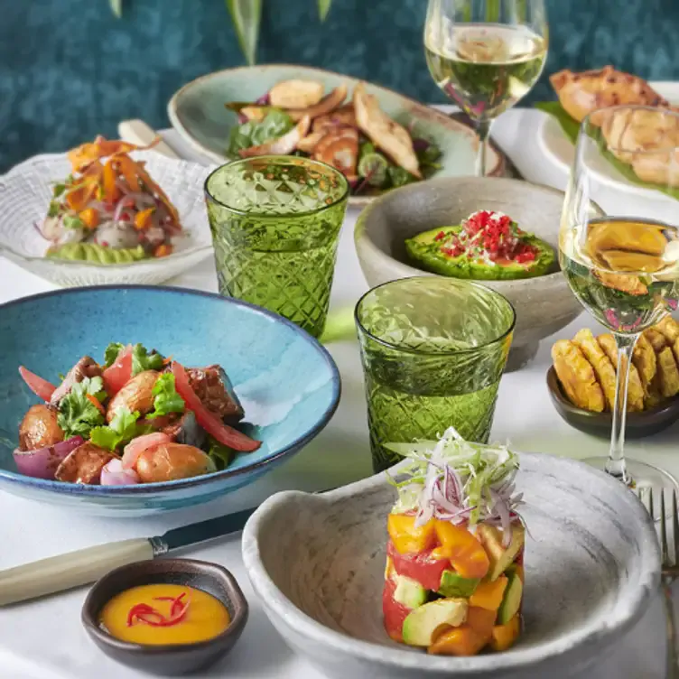 A table of several colourful dishes native to the Latin American region at Amazonico.