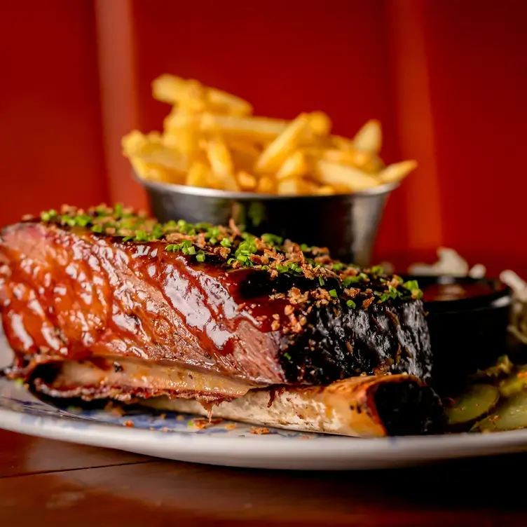 A plate of beef short rib and fries at Blues Kitchen, one of the best live music restaurants in London.