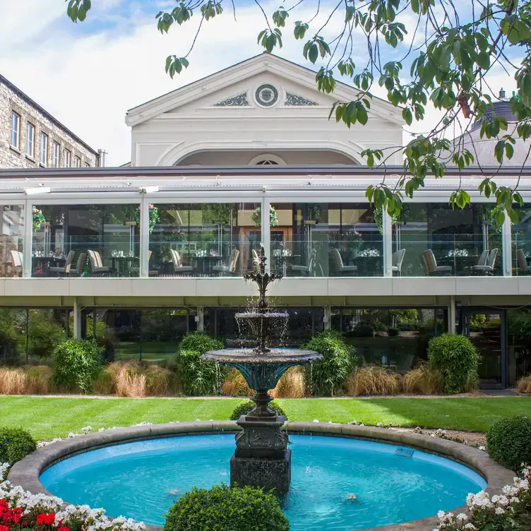 The terrace overlooking the gardens and fountain at FIRE Steakhouse & Bar, one of the best restaurants in south Dublin.