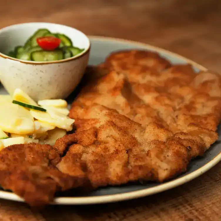 A classic German schnitzel at Schnitzelei, one of the best German restaurants in Berlin.