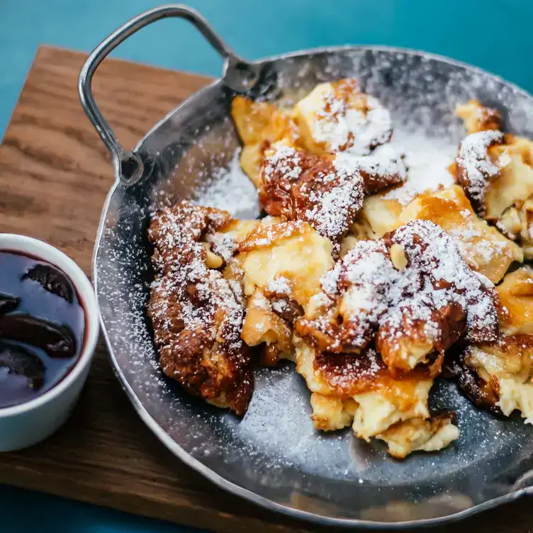 A crispy Austrian dessert served in a pan at Einstein Unter den Linden, one of the best German restaurants in Berlin.