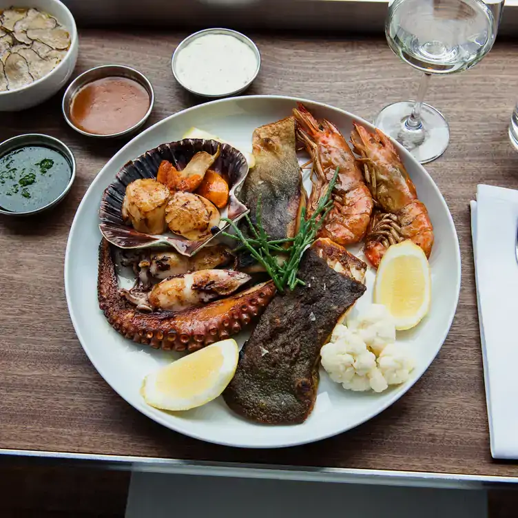 A seafood platter featuring octopus, shrimps and scallops at Funky Fisch, one of the best seafood and fish restaurants in Berlin.