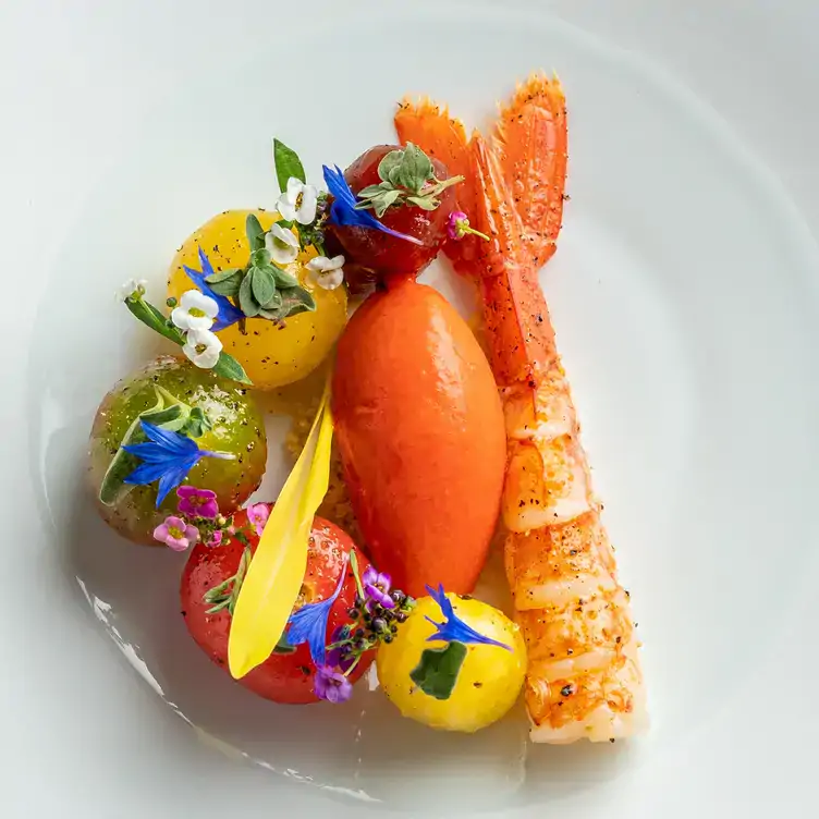 A shrimp dish with cherry tomatoes served at Pied à Terre, which has some of the best tasting menus in London.