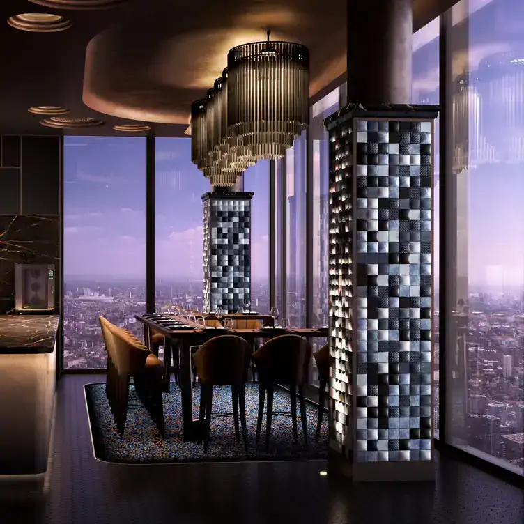 The chef’s table at Gordon Ramsey’s latest sky-high venture, with views over London at night.