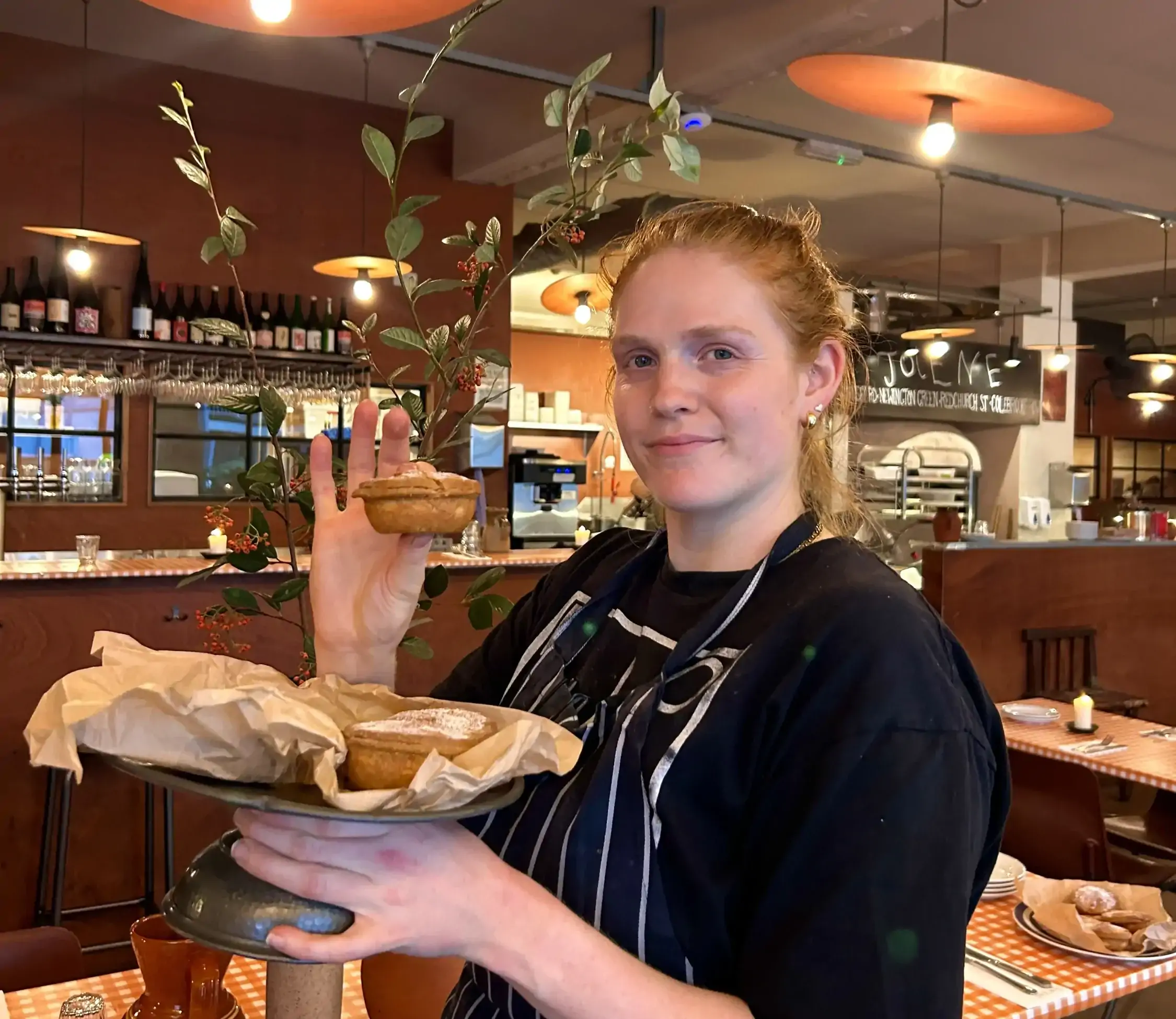 Sous baker Ellie holding mince pies at Jolene in London