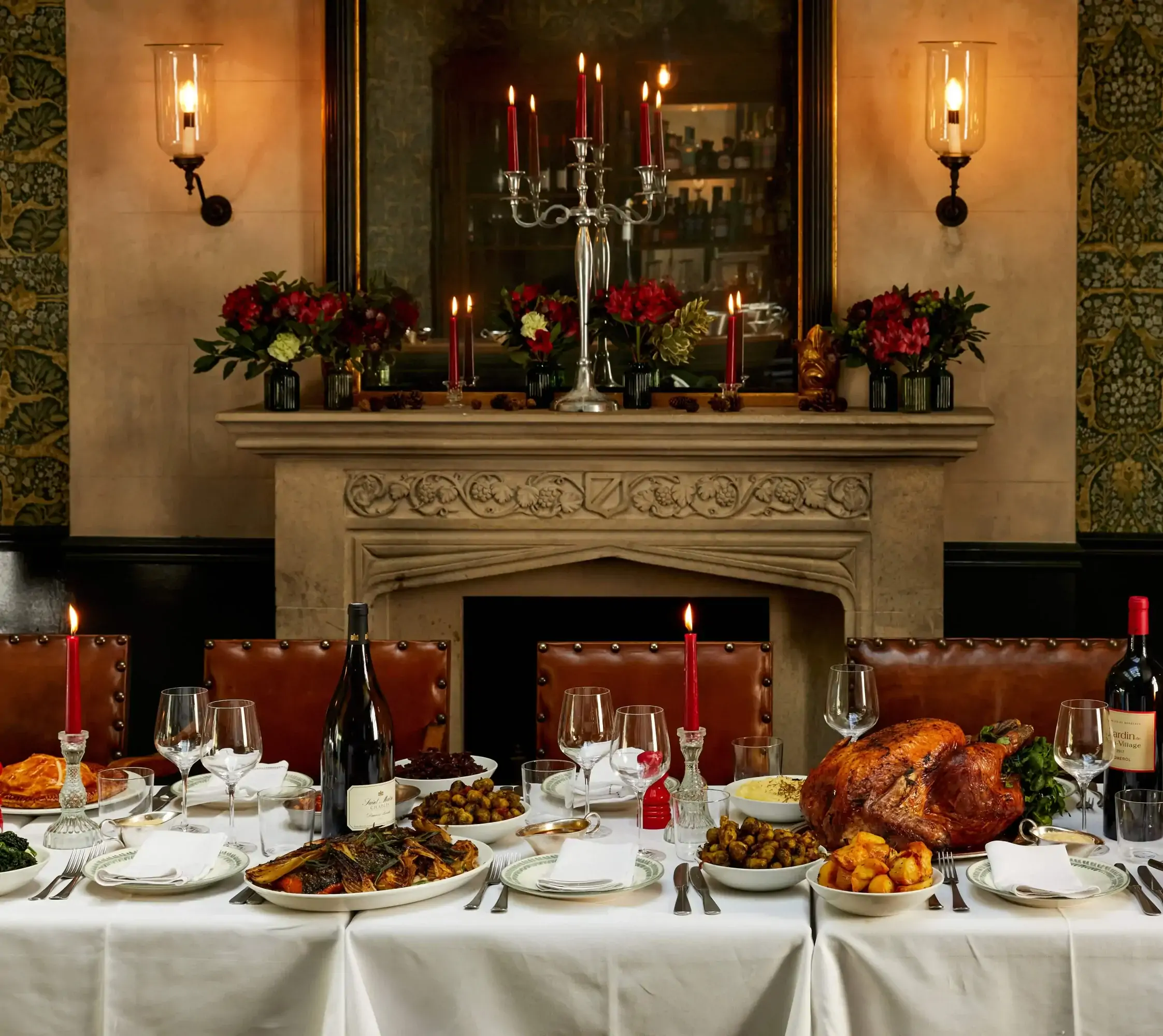 A long table by the fireplace at The Thomas Cubitt Pub Belgravia, one of the most festive restaurants in the UK, set with turkey and all the trimmings.