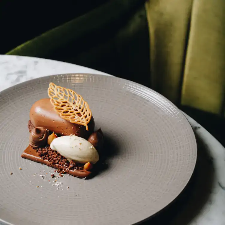 A chocolate dessert with leaf biscuit and ice-cream, from the festive menu at Suesey Street.