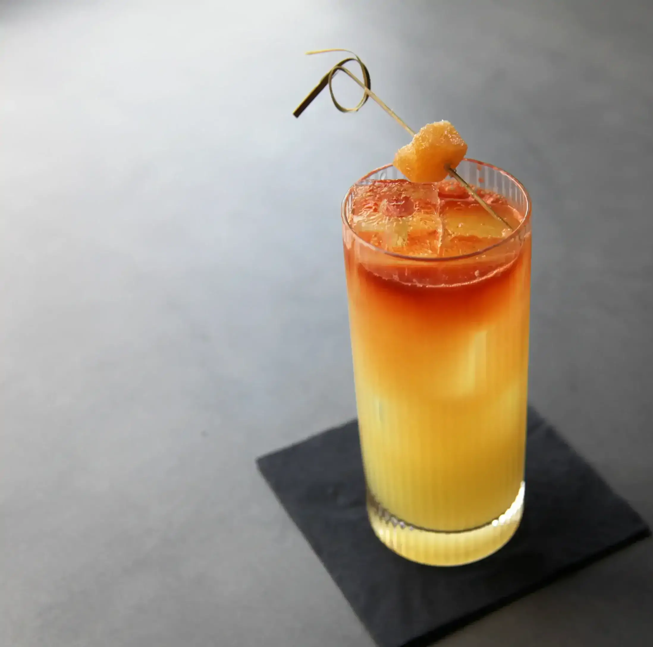 A yellow and orange mocktail at Jazu Bar in London