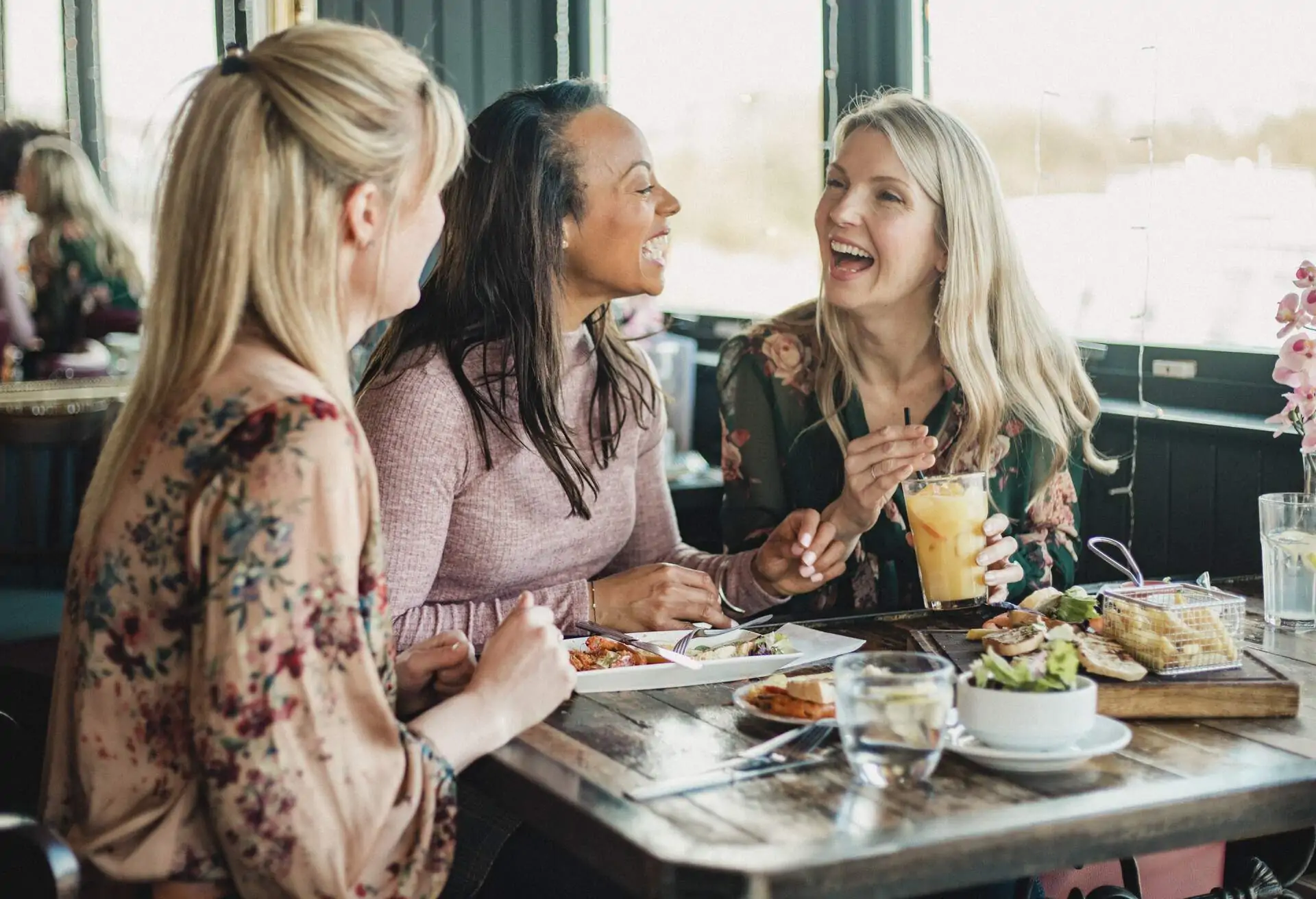 Friends enjoying dining experience